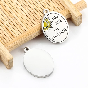Polished stainless steel sun pendant necklace with You Are My Sunshine engraving