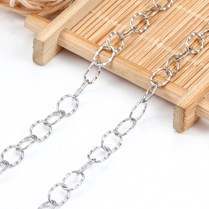 Polished stainless steel oval link chain with textured diamond-cut finish for DIY jewelry