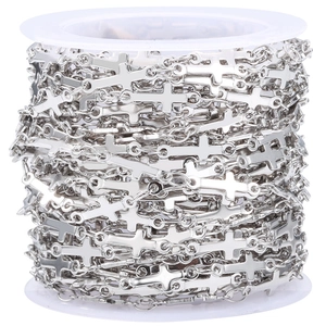 Silver stainless steel cross chain on white spool for DIY jewelry making and crafts