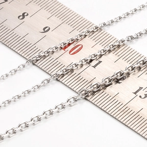 Detailed close-up of 2mm silver stainless steel O-chain with measuring scale