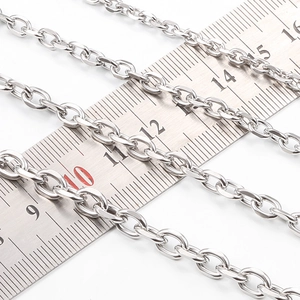 Polished stainless steel cross chain necklace for DIY jewelry shown with measurement ruler