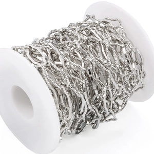 Close-up of textured wavy stainless steel chain roll for DIY jewelry making