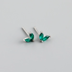 Detail view of S925 silver stud earrings with two marquise-cut emerald green zircons