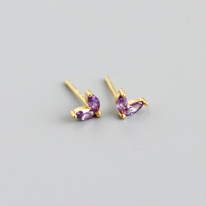 Close-up of gold S925 silver stud earrings with purple marquise cut zircon stones