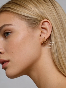 Three-piece set of golden beaded hoop earrings in sizes 9mm, 10mm, and 12mm on ear