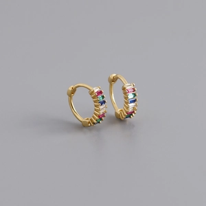 Close-up of gold hoop earrings featuring multi-color rectangular-cut rainbow zircons