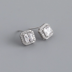 Macro shot of square halo stud earrings with princess cut cubic zirconia in S925 silver