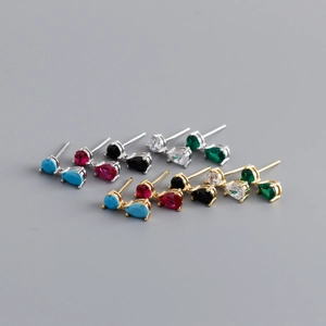 Macro shot of S925 silver stud earrings with multi-color teardrop zircon stones