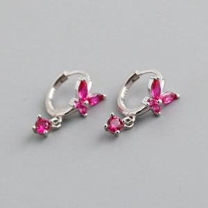 Macro shot of S925 sterling silver stamp on pink butterfly earrings with zirconia stones