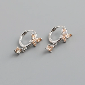 Detail view of S925 sterling silver butterfly earrings with champagne zircon stones