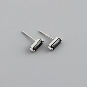Macro shot of S925 sterling silver stud earrings with rectangular black cubic zirconia
