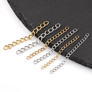 Cadenas de extensión de 5cm en acero dorado y plata con colgantes de gota sobre piedra