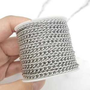 Detailed view of silver stainless steel curb chain spool for DIY jewelry making