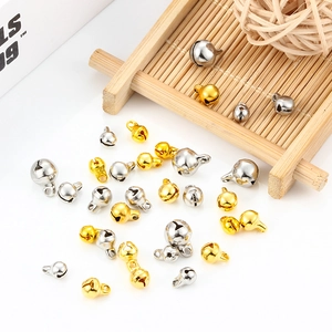 Golden and silver stainless steel hollow bell pendants for DIY jewelry and crafts