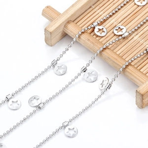Polished stainless steel ball chain necklace with hollow star charms on white background