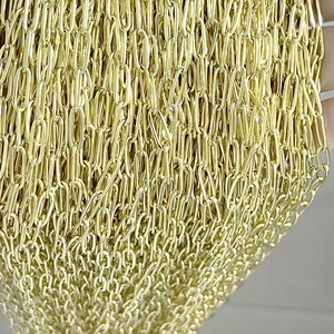 Macro shot of gold-plated stainless steel paperclip chain links for DIY jewelry making