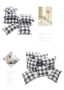 Vue détaillée de la texture du lin teint en fil sur les housses de coussin à carreaux