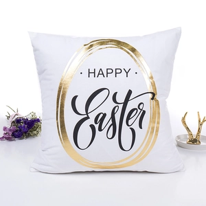 White Easter cushion cover with golden egg design and Happy Easter text in black