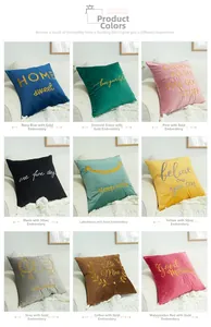 Detail of embroidered velvet pillowcases with assorted colors and gold leaf patterns