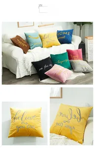 Close-up of velvet throw pillow cover with high-quality embroidery detail and texture