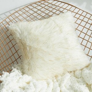 Minimalist white faux fur throw pillow cover with subtle gold metallic tinsel details
