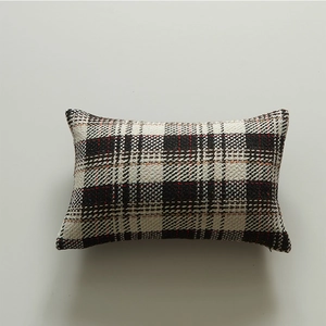 Pastoral plaid rectangular pillow cover in red, black, and white tartan woven fabric