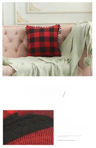 Detail of red and black buffalo plaid pillowcase featuring decorative black pom-pom trim