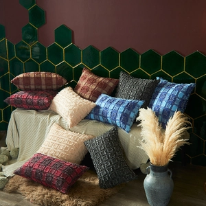 Tufted plaid decorative pillow covers in various colors on a modern bench setup