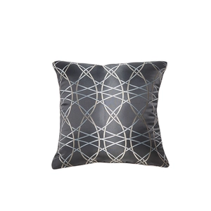 Modern grey satin pillow cover featuring metallic gold and silver geometric circle patterns