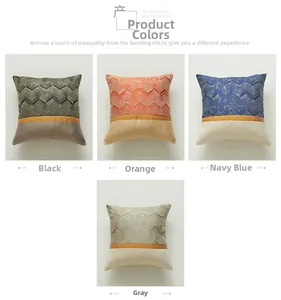 Close-up of modern pillow cover with gold geometric pattern and color block splicing