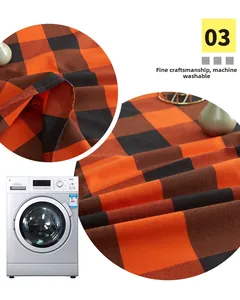 Detail of machine washable orange and black buffalo plaid table runner fabric