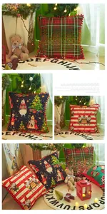 Detail of Christmas pillowcase with red pom-pom edges and festive plaid pattern