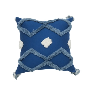 Housse de coussin brodée nordique avec motifs géométriques et pompons bleus bohèmes