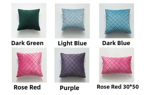 Detail of velvet pillow covers with diamond stitching in various colors and sizes