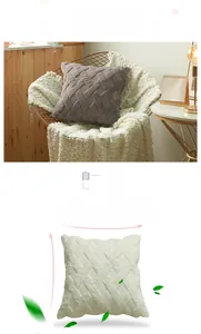 Close-up of geometric woven plush cushion cover texture in gray and cream white
