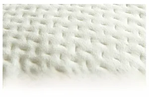 Macro detail of white cushion cover fabric with 3D wave pattern and soft texture