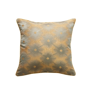 Gray and gold jacquard throw pillow cover with floral pattern and piped edges