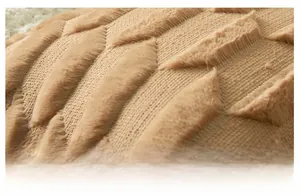 Vista macro di ecopelliccia con trama geometrica 3D e morbida superficie felpata