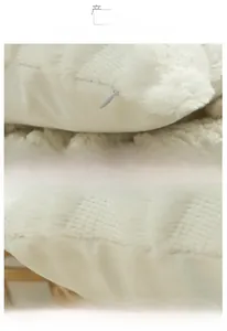 Detail of hidden zipper and overlock stitching on geometric plush pillow cover
