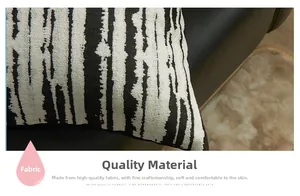 Close-up of black and white jacquard pillowcase fabric with textured wave patterns