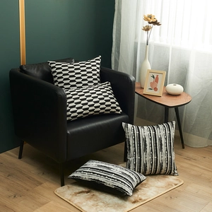 Italian-style black and white jacquard cushion set with geometric and abstract patterns