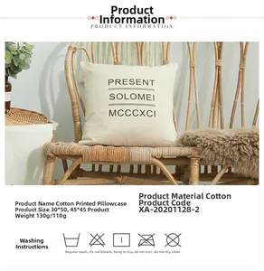 Detailed view of cream cotton pillow case with black letter print and care icons