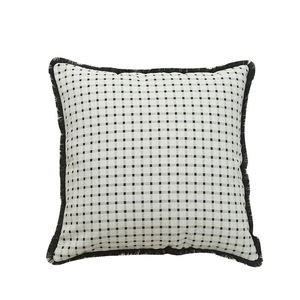Modern black and white checkered decorative pillow cover with thick fringe trim edges