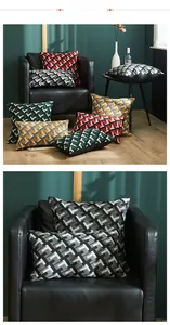 Close-up of geometric T-pattern jacquard cushion covers with rich textured knitting