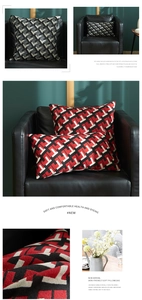 Close-up of geometric jacquard woven pillowcase with monochrome T-pattern on a sofa