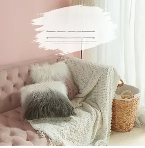 Detail of soft gradient faux fur pillow cover showing fluffy texture on a pink sofa