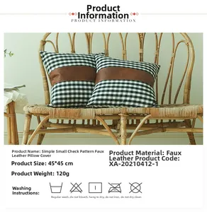 Close-up of 45x45cm check pattern cushion cover with brown faux leather splice detail