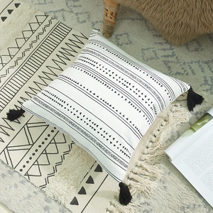Bohemian cotton canvas throw pillow cover with black geometric prints and fringe tassels