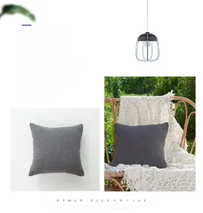 Detail of dark grey textured chenille pillowcase with modern denim style fabric grain