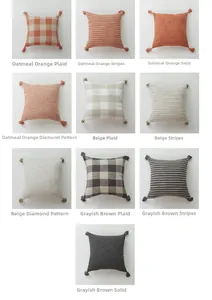 Close-up of textured linen pillowcases with tassels, stripes, and checkered patterns